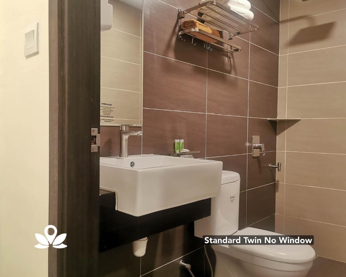 Zen Rooms Ambassador Residence Бинтулу Экстерьер фото