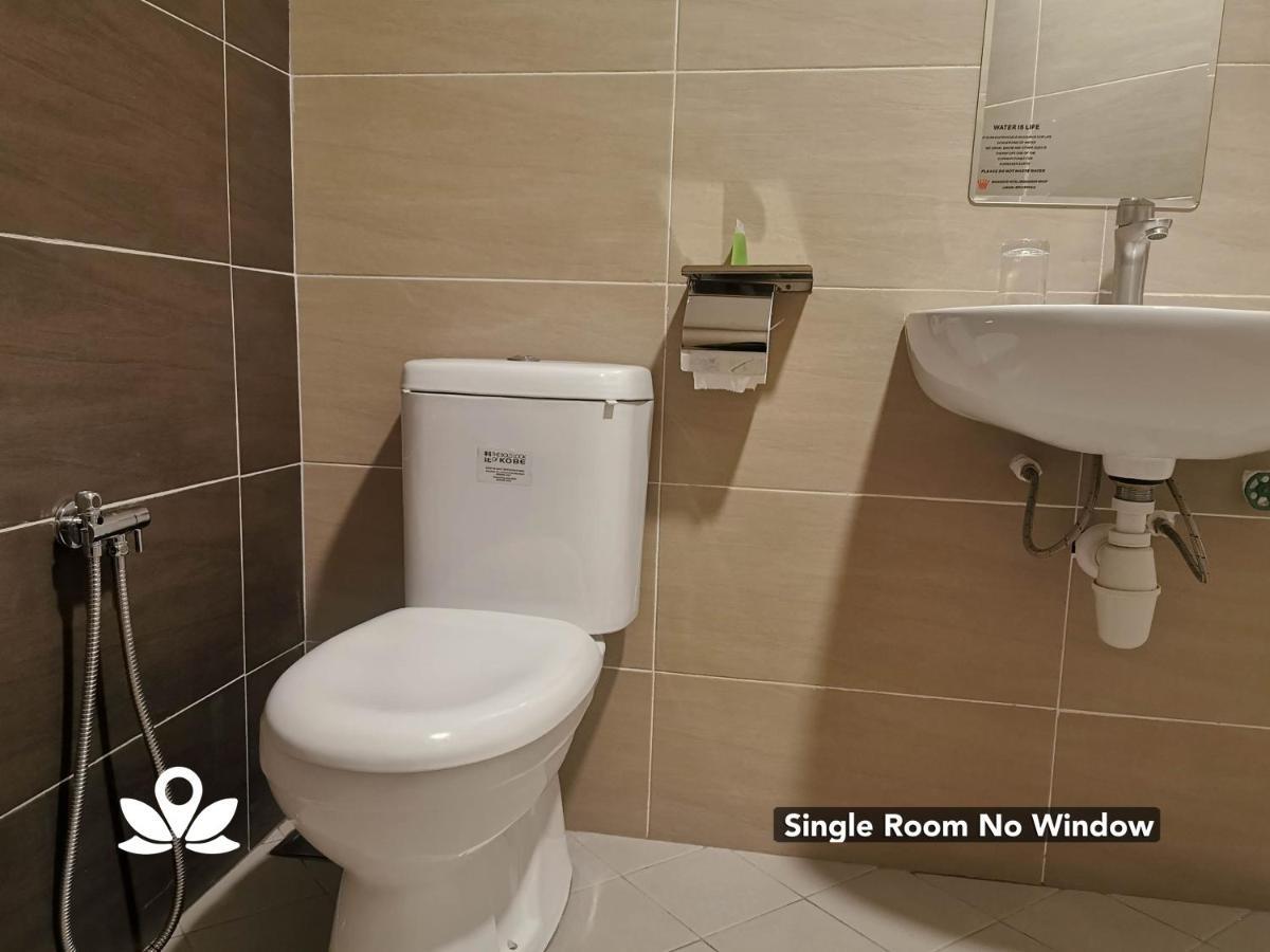 Zen Rooms Ambassador Residence Бинтулу Экстерьер фото