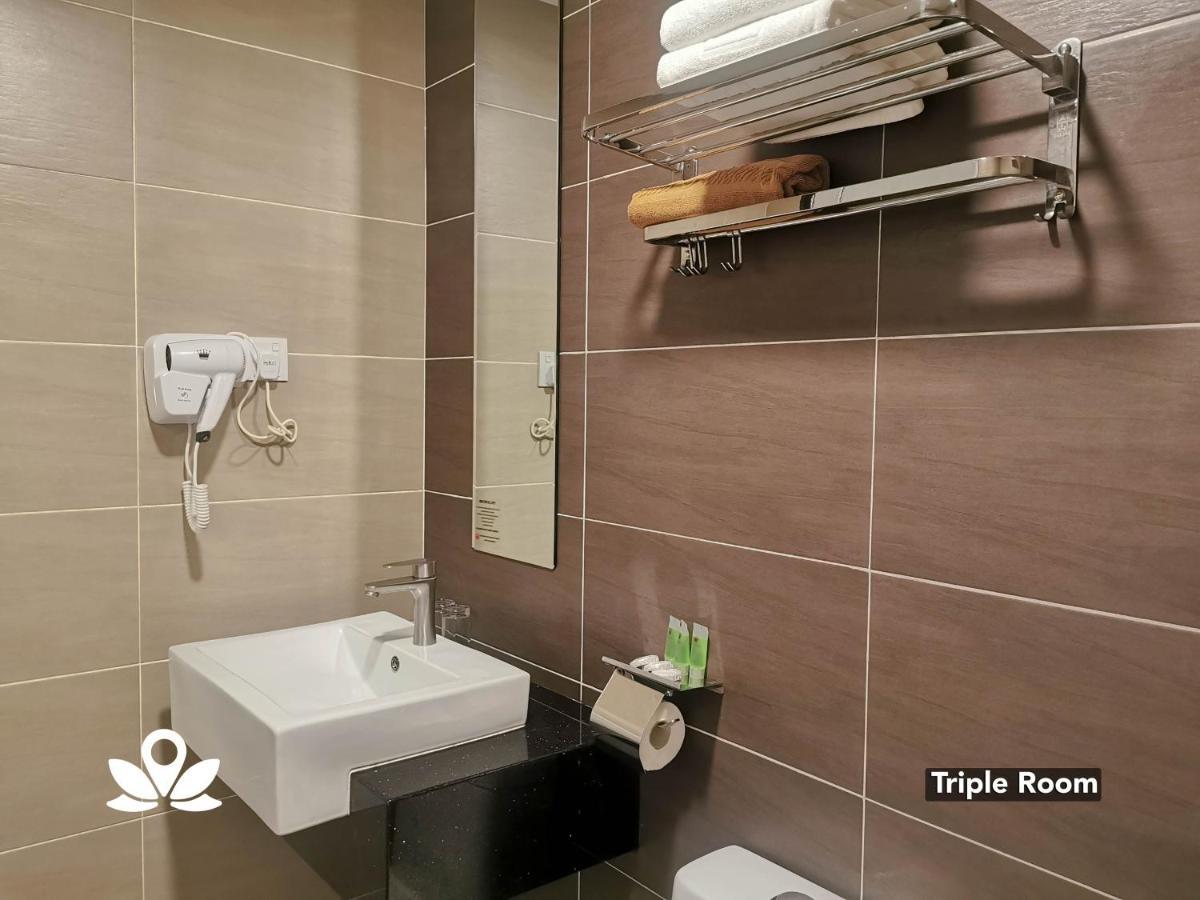 Zen Rooms Ambassador Residence Бинтулу Экстерьер фото